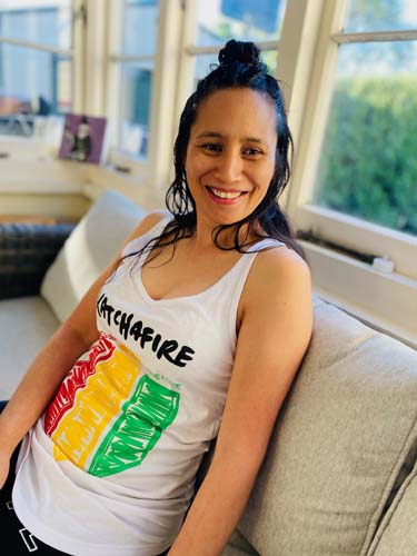 The Katchafire Womens One Love Singlet is a fun, vibrant singlet available in Black or White.  The tri colour shield with the lyrics of Love Letter... One Love Baby