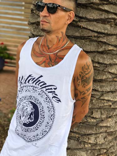 The Katchafire Mens Mandala Singlet is a Maori inspired design incorporating Katchafire's signature lion head in the centre.  Available in Rasta colour print, Navy on White Tees and White on Maroon tees too.