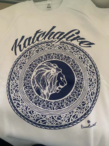 The Katchafire Mandala Crew Navy is a Maori inspired design incorporating Katchafire's signature lion head in the centre.  Navy print available in tees and singlets.
