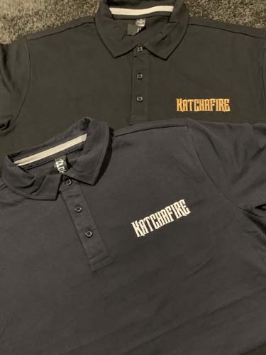 The Katchafire Polo Shirt is available in Navy and Black.  With a Katchafire text logo on the left chest.  Contrasting Embroidery colours.  S - 5xl.